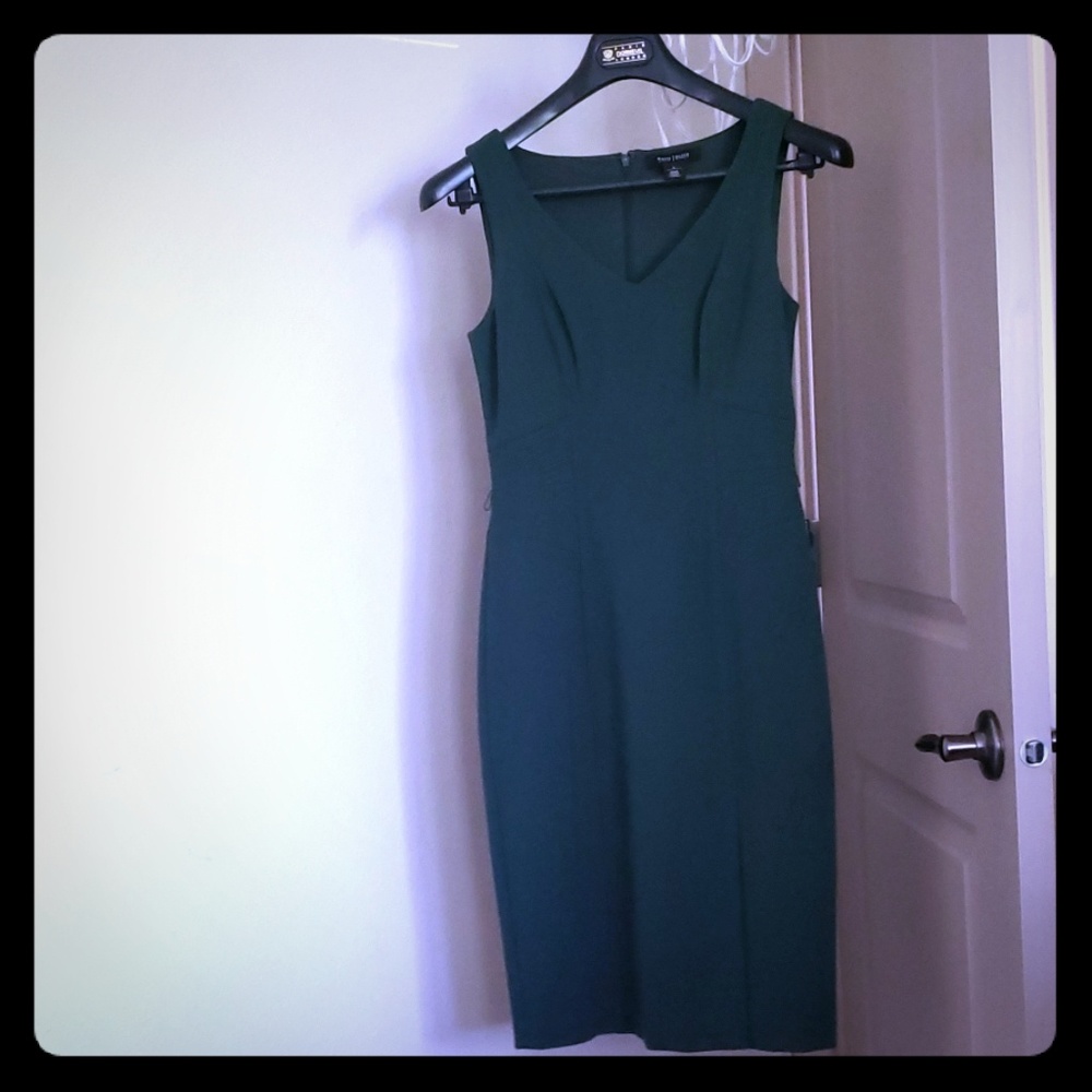 A jade colored business dress
